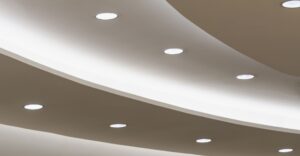 Rows of circular LED lights in building